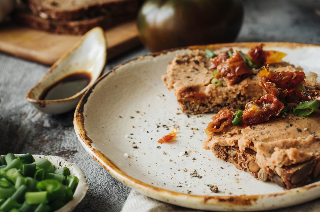 dried tomato bean spread, vegan recipes, on bread, tasty meal ideas, vegan bread
